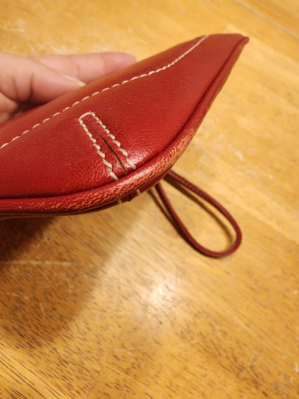 vintage Coach red leather Soho mini wristlet pouch featuring white contrast